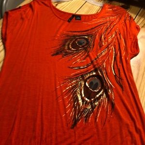 Orange w/ shiny feathers, Fits like a Large